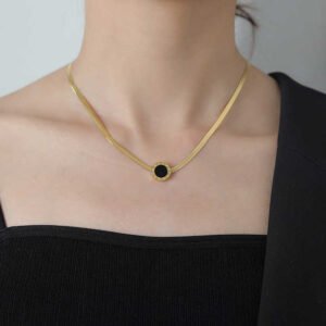 Gold Plated Snake Chain Necklace Featuring a Chic Round Black Pendant for a Modern and Timeless Aesthetic
